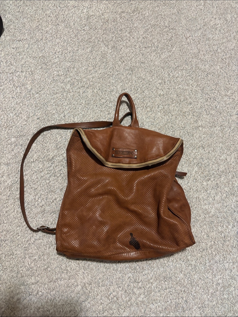 PIKOLINOS cognac perforated leather backpack with cream trim
Made in Italy
